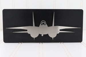 Metallic airplane design on a black background