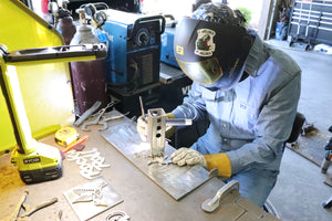 Shawn from Custom Hitch Covers in workshop